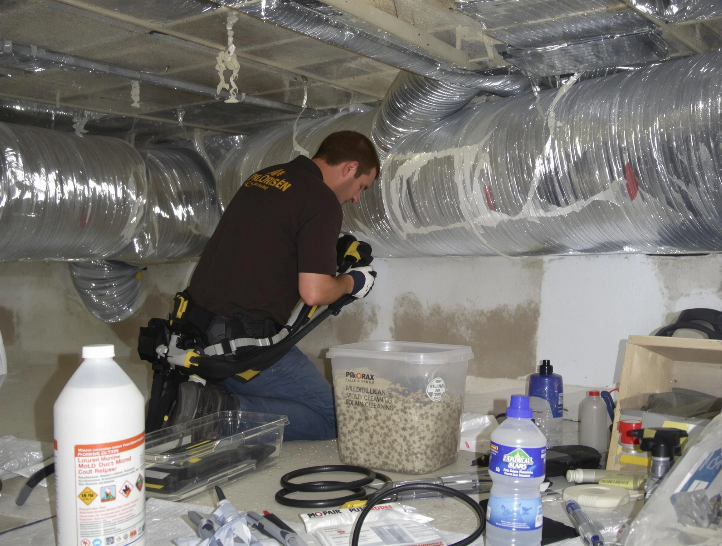 Framingham Air Duct Cleaning specialist performing professional mold removal from air ducts in Framingham